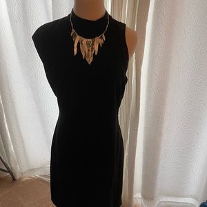 Halston Heritage asymmetrical shoulder LBD sophisticated and a little edgy,